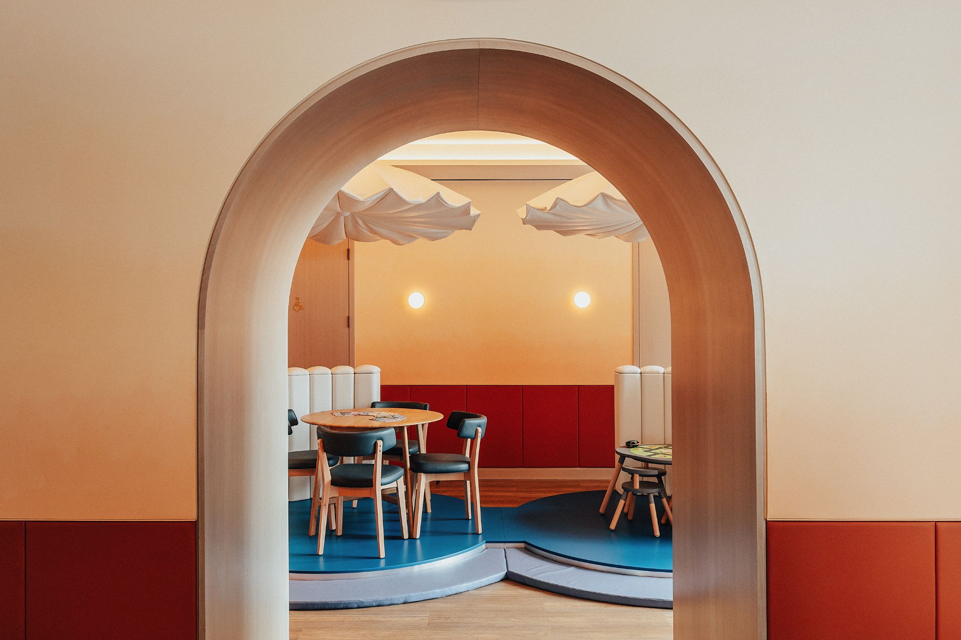 Children's play area with cloud motifs