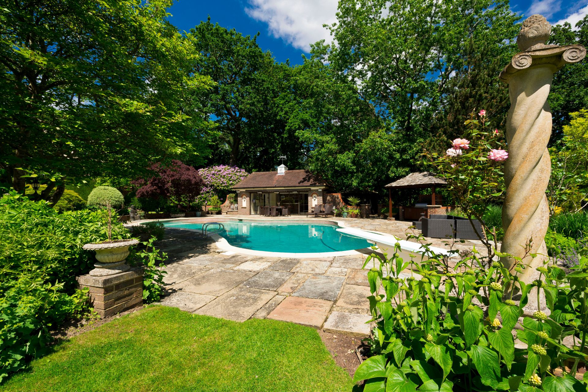 Outdoor pool with patio area