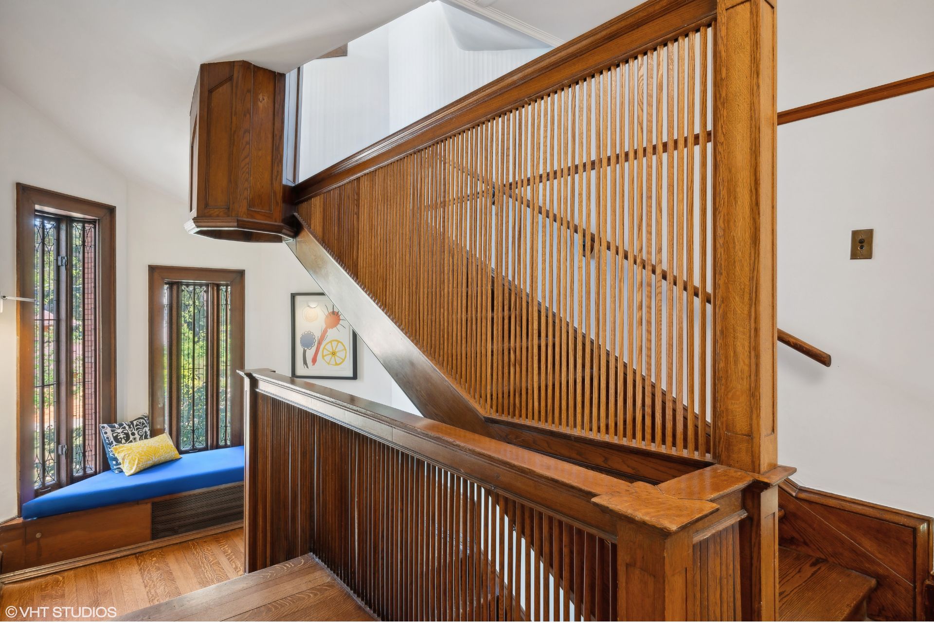 Staircase with intricate wooden partition