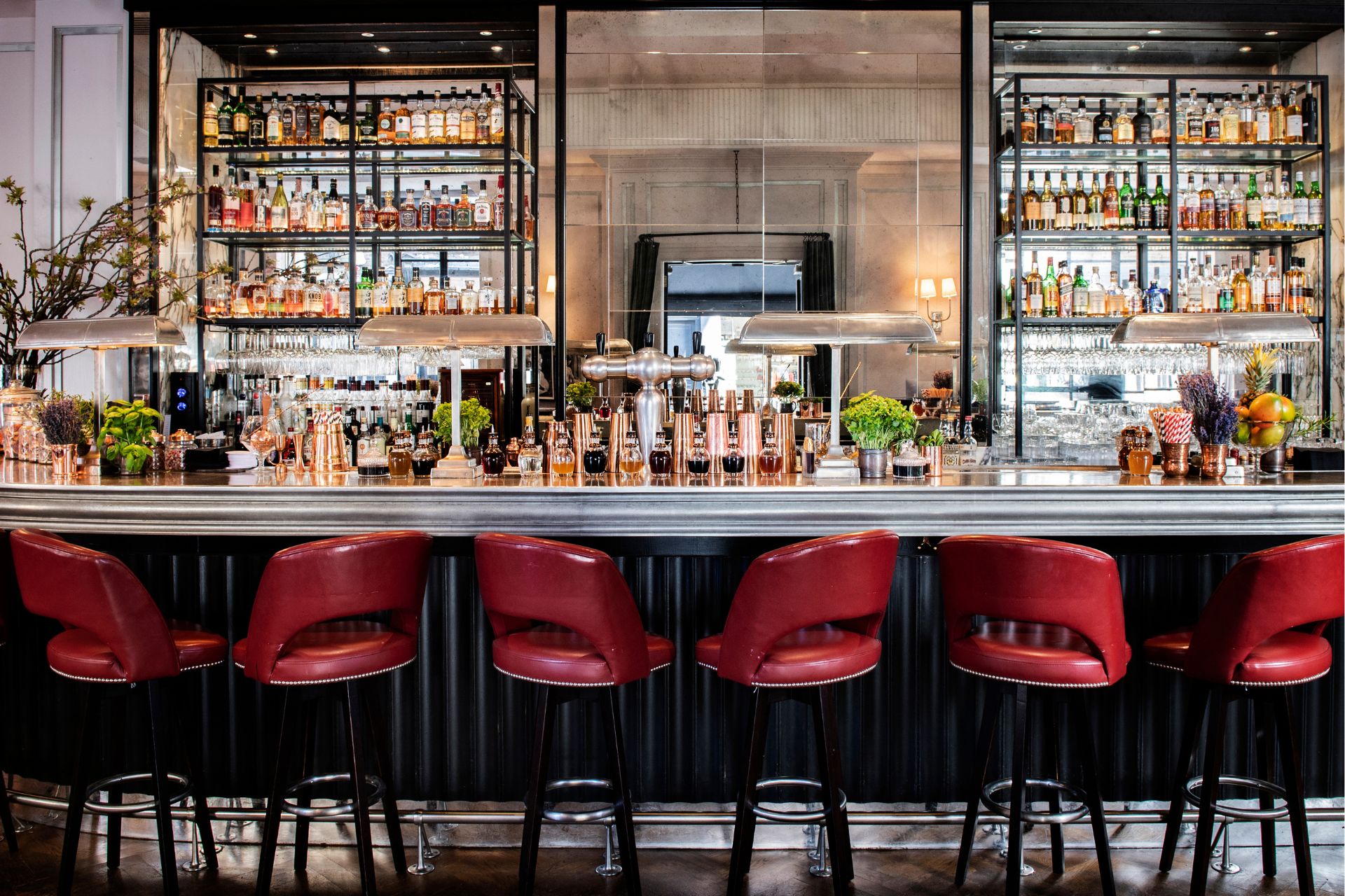 Bar with red leather stools