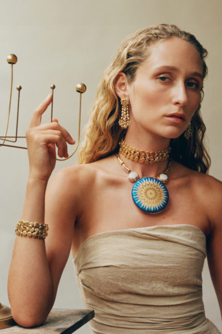 Woman wearing gold jewellery