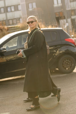 Woman with bell-bottom bob