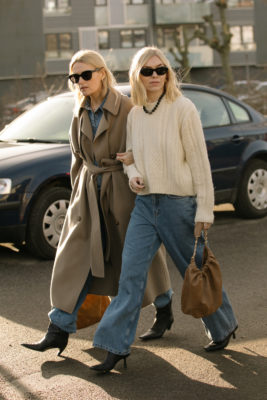 Two women with oyster blonde hair