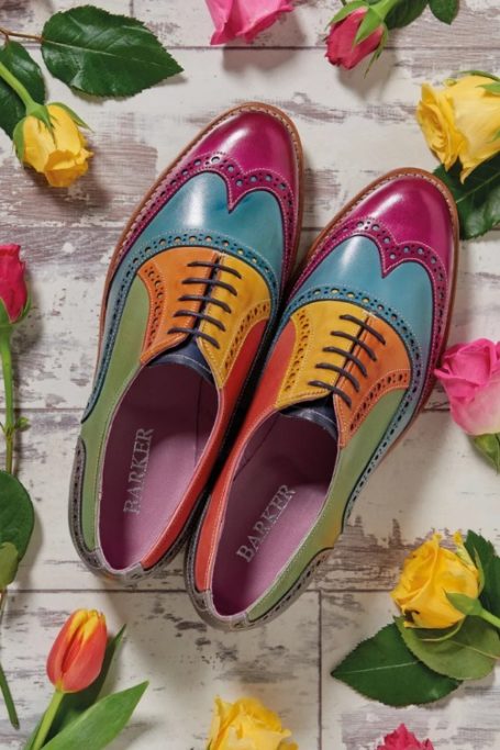 Colourful brogues surrounded by flowers