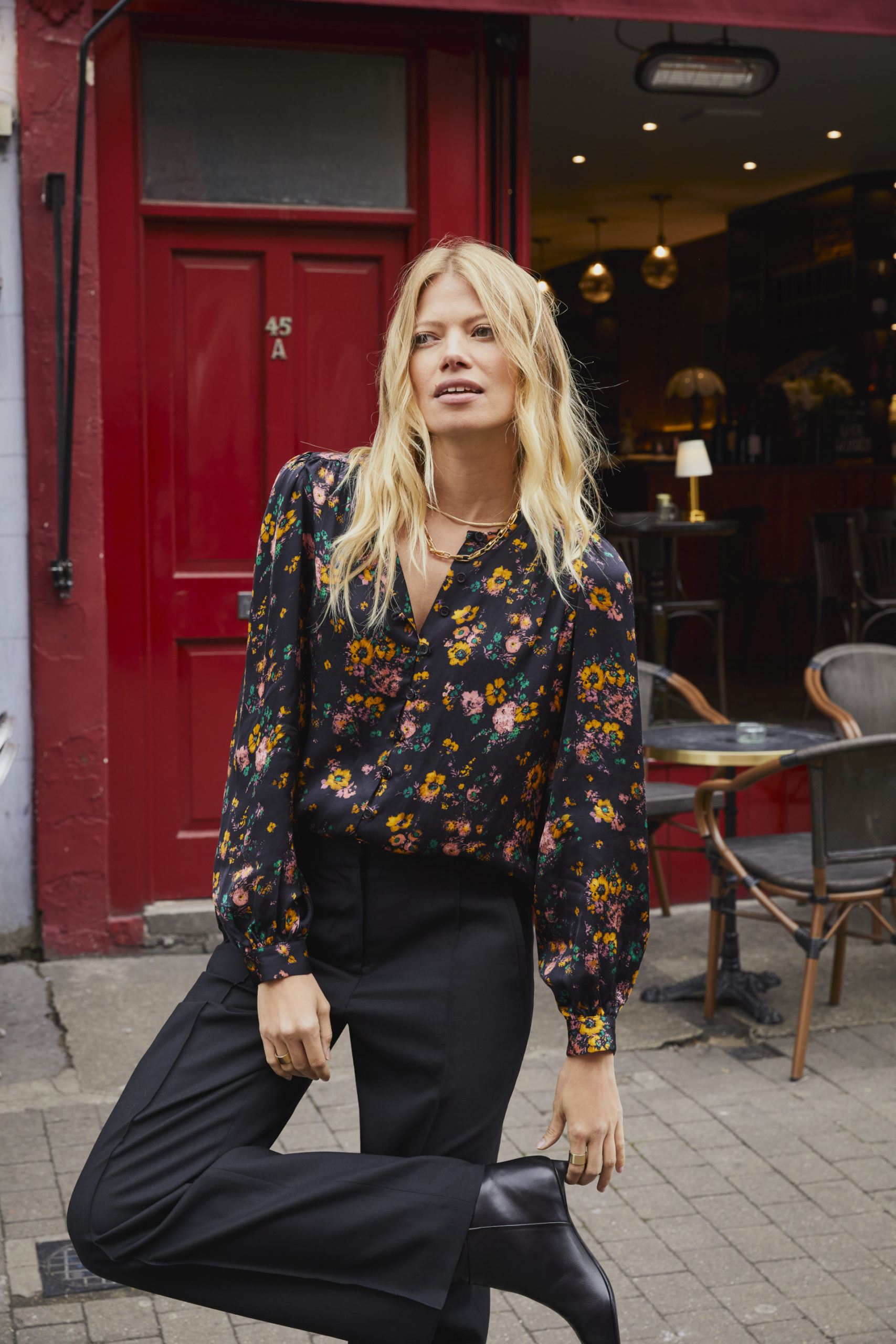 Woman in blouse and trousers