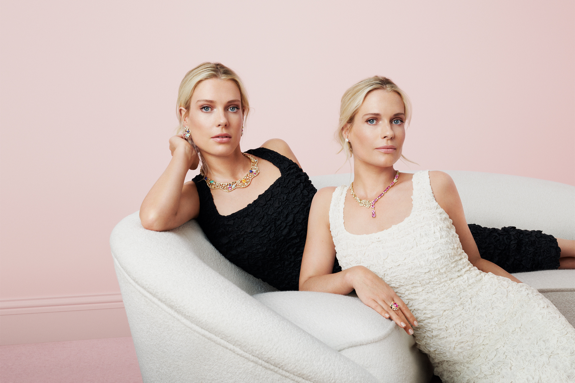 Two women wearing jewellery