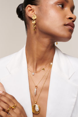 Woman wearing gold jewellery