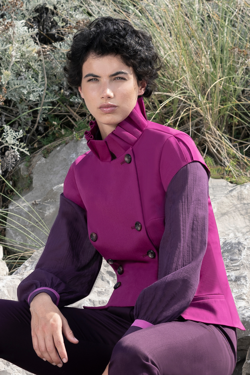 Woman wearing purple jacket