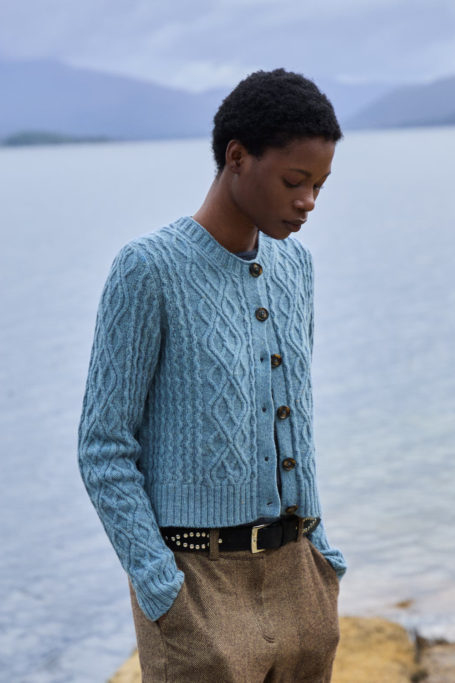 Woman wearing blue cardigan