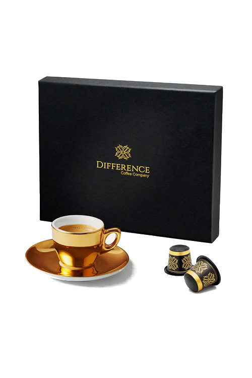 Box of coffee pods with gold cup