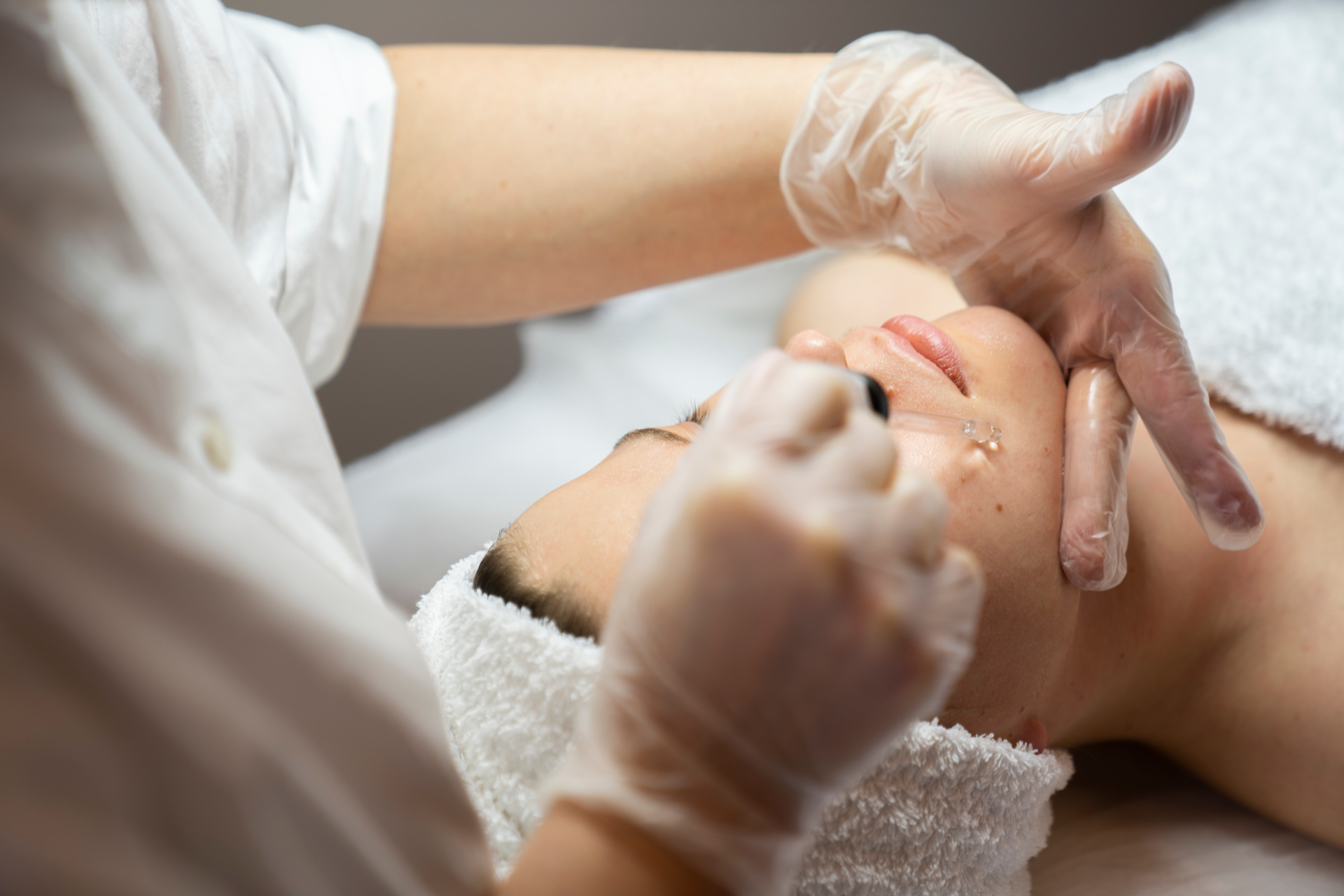 Woman receiving facial