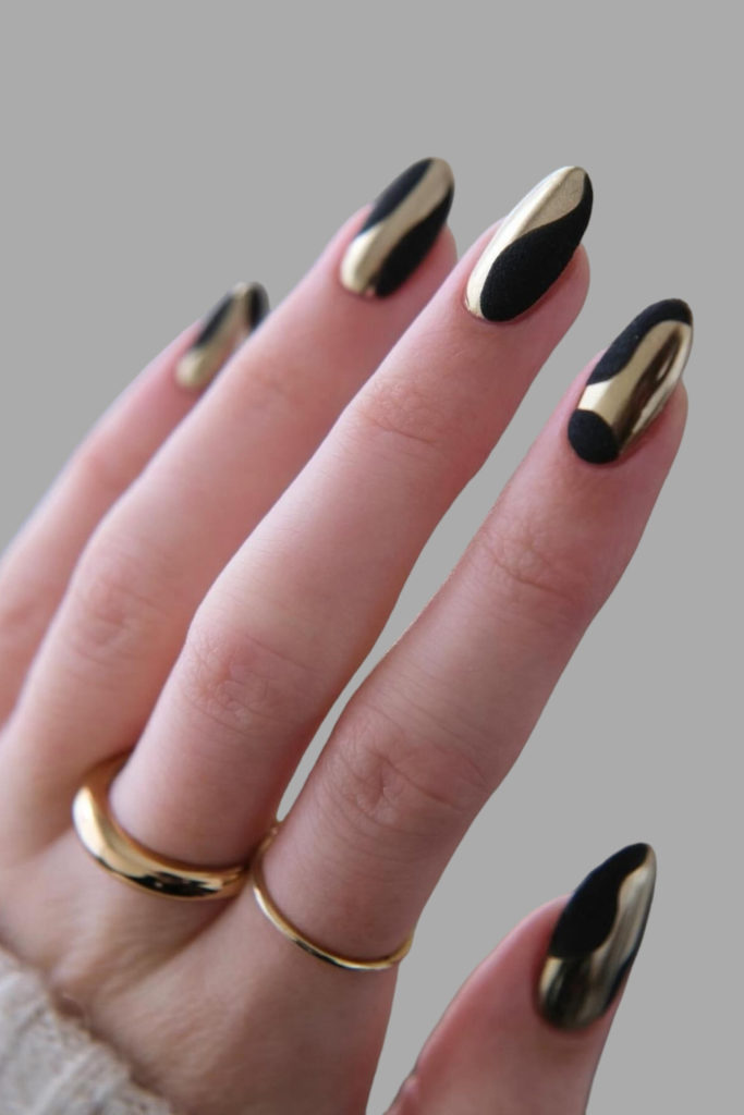 Black and gold Scorpio nails