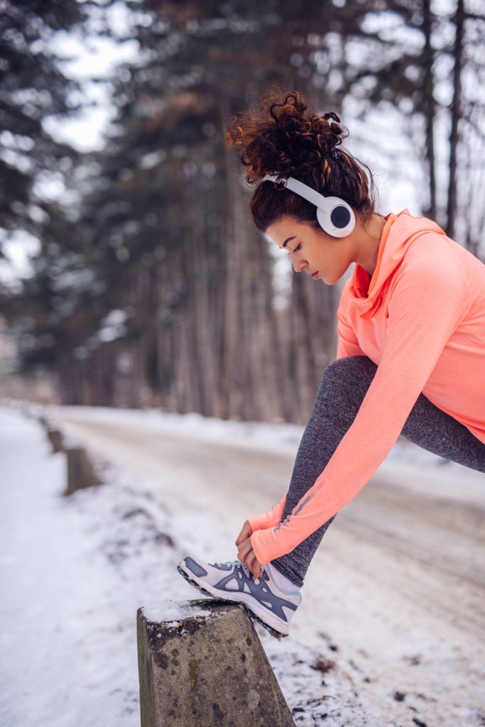 Woman running in winter