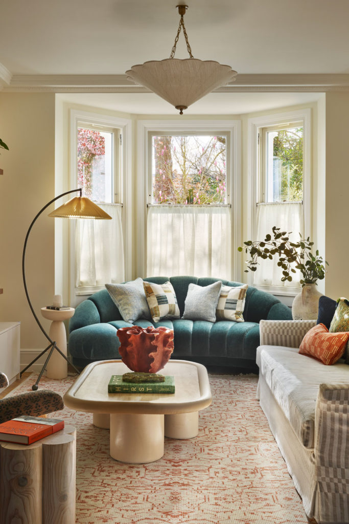 A light family living room in Kensington with French influence
