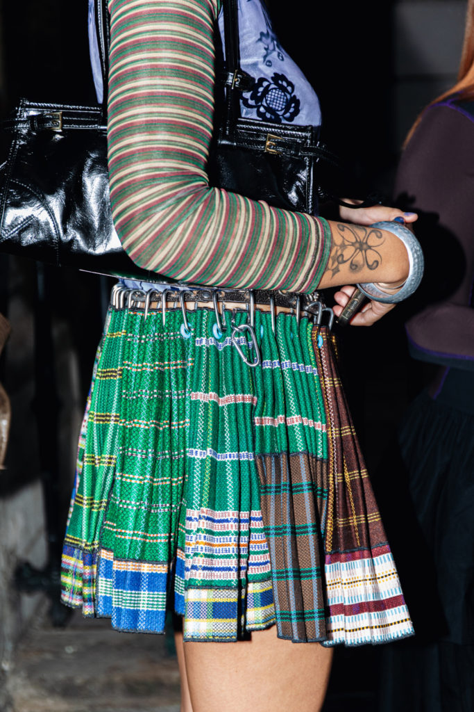 Close up of someone wearing a skirt