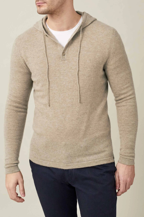 Man wearing beige hoodie
