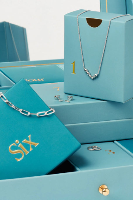 Blue numbered boxes with jewellery