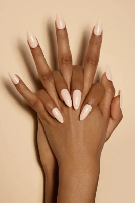 Hands with vanilla chai nails