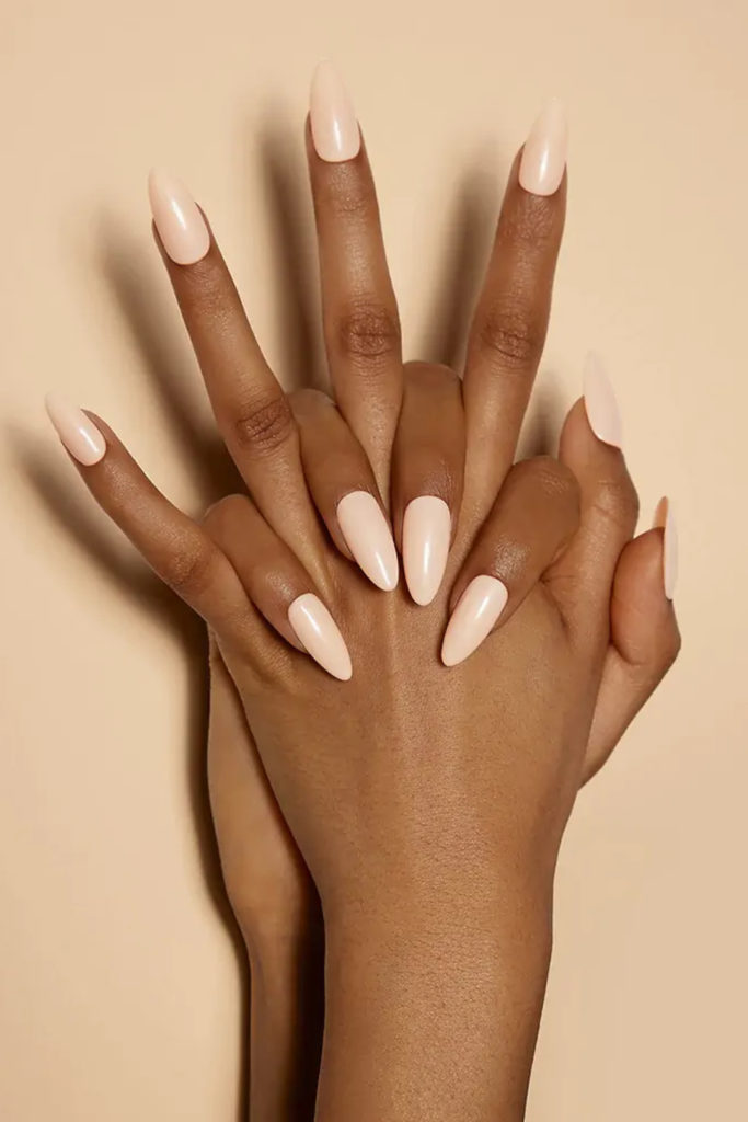 Hands with vanilla chai nails