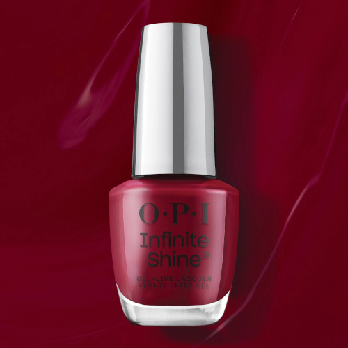 Red nail polish on red background