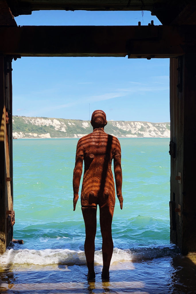 An Antony Gormley sculpture by the sea