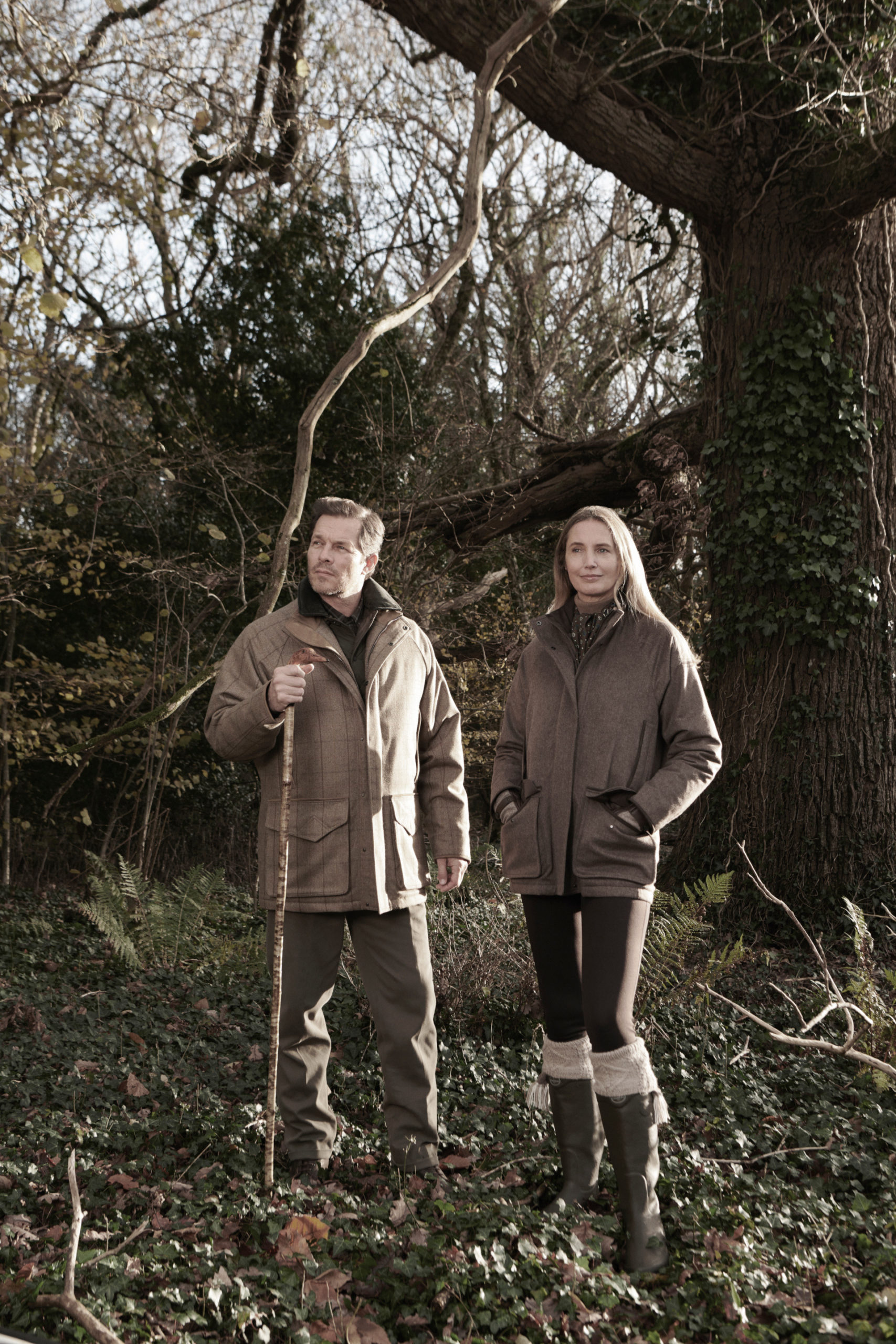 Man and woman stood in wooded area