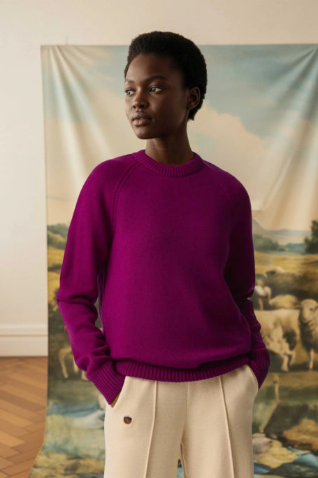 Woman wearing purple jumper