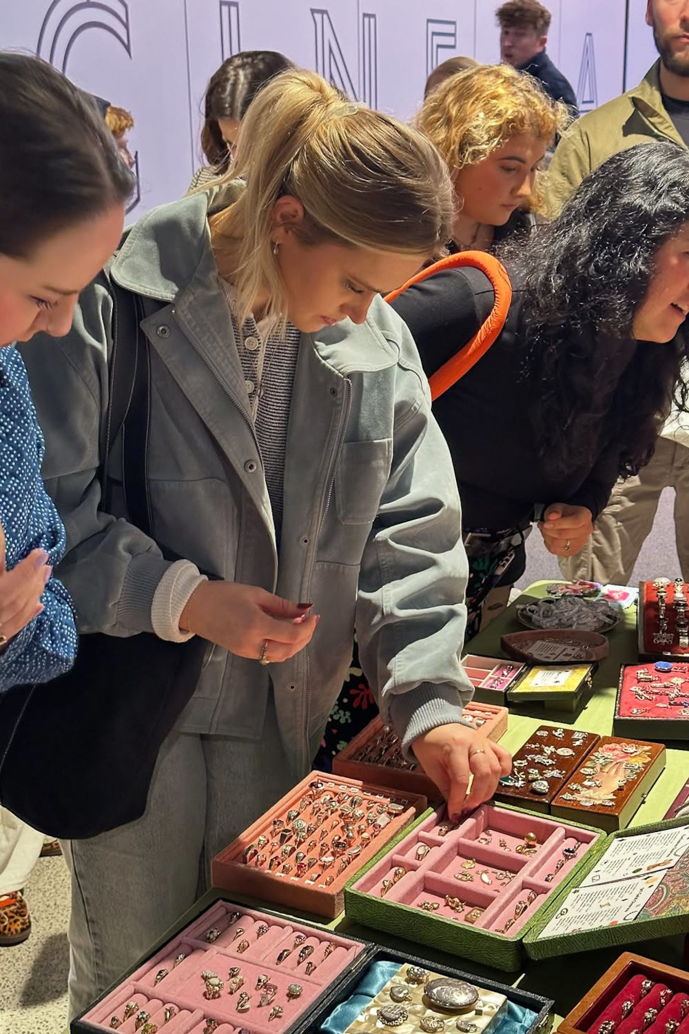 People shopping jewellery at Salad Days Christmas market