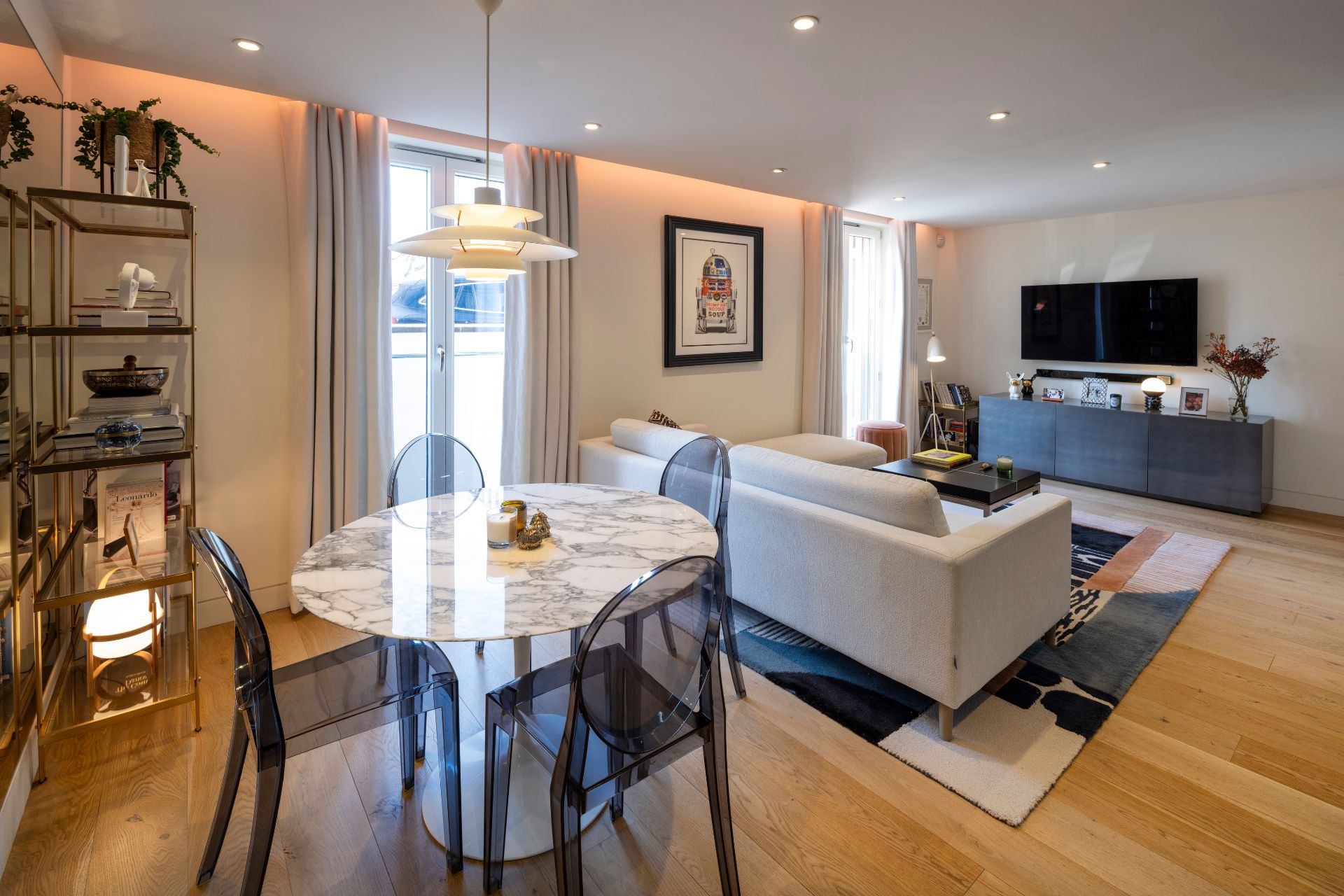 Living room with cream sofa and marble table