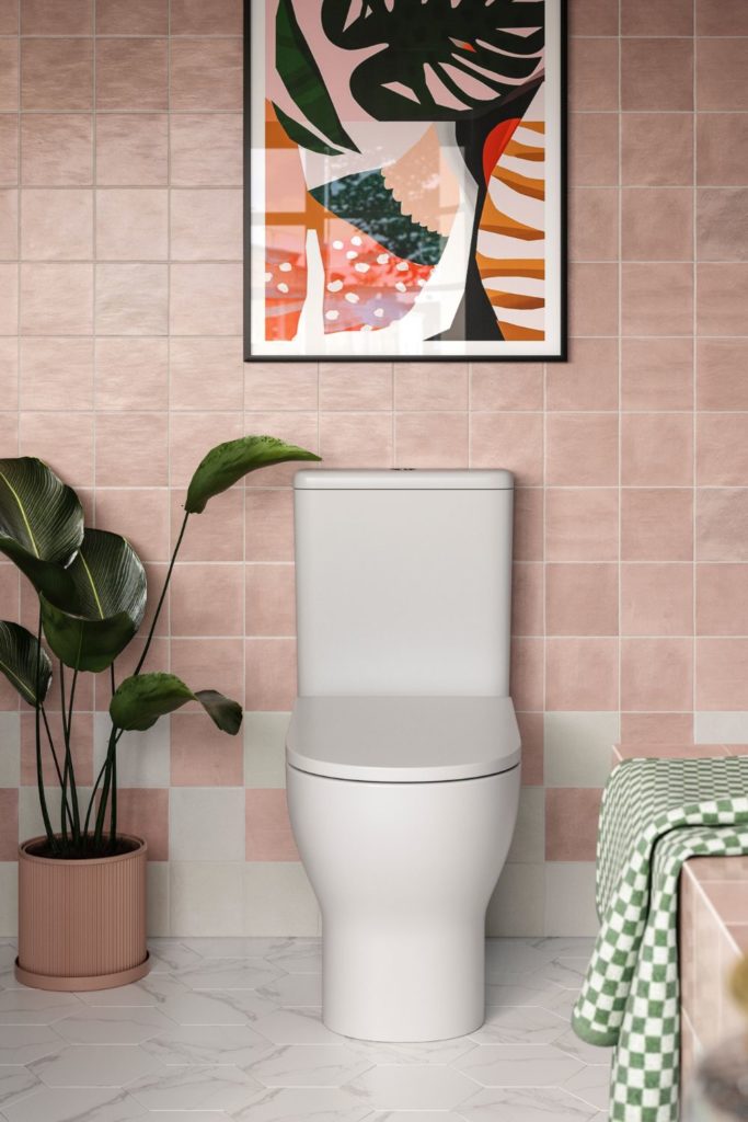 Pale pink tiled bathroom