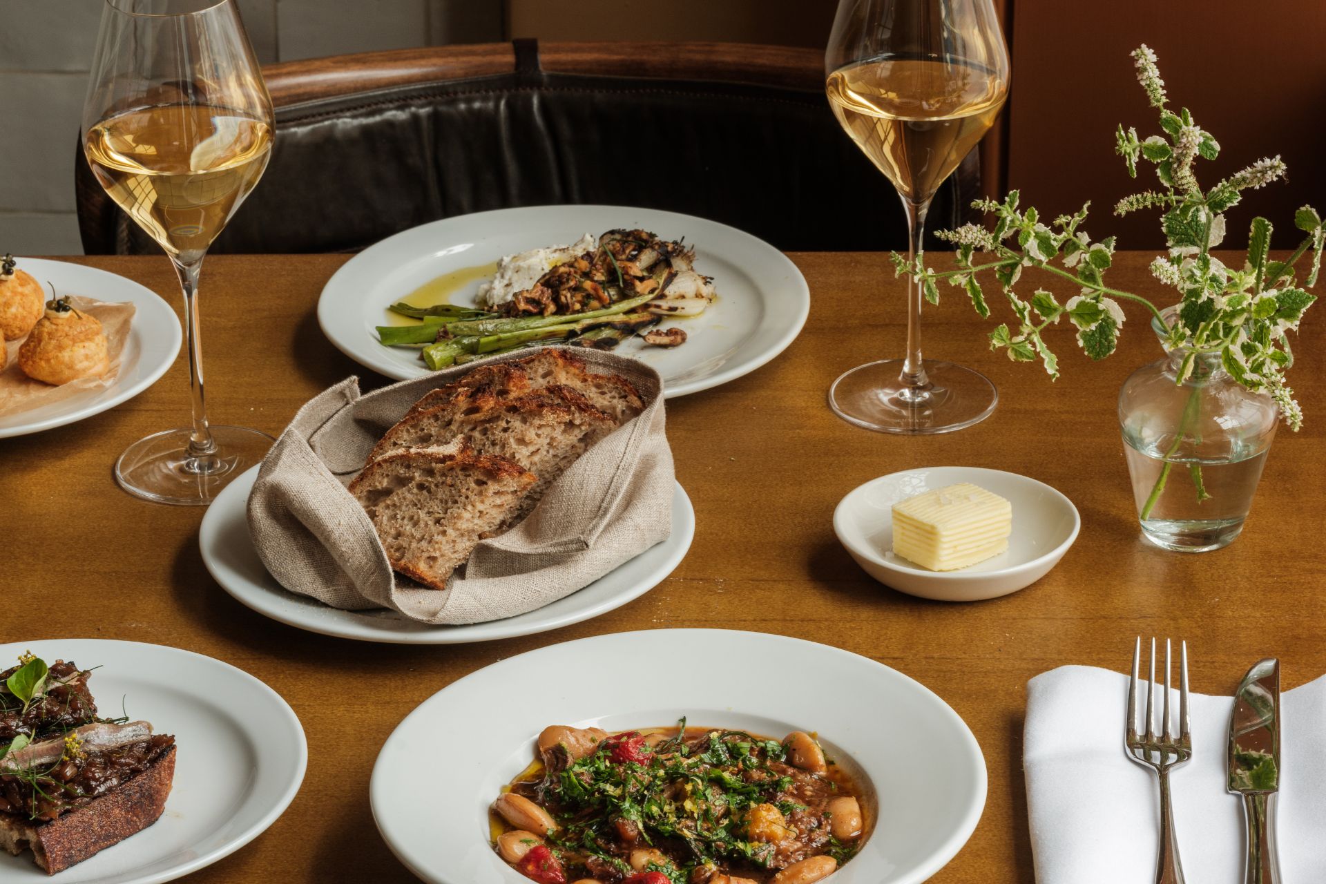 Table of food and white wine