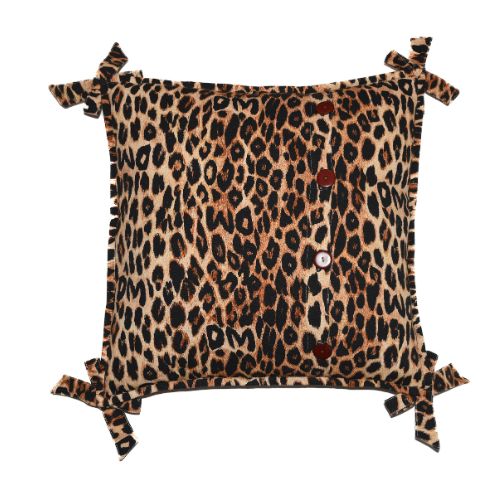 Leopard print cushion with bows at the corners
