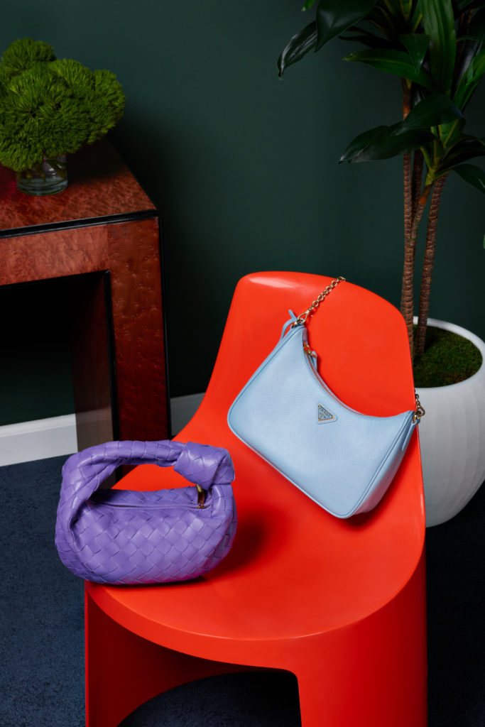 Handbags on orange chair | ReLuxury & Barnes Pre-Loved Luxury Show