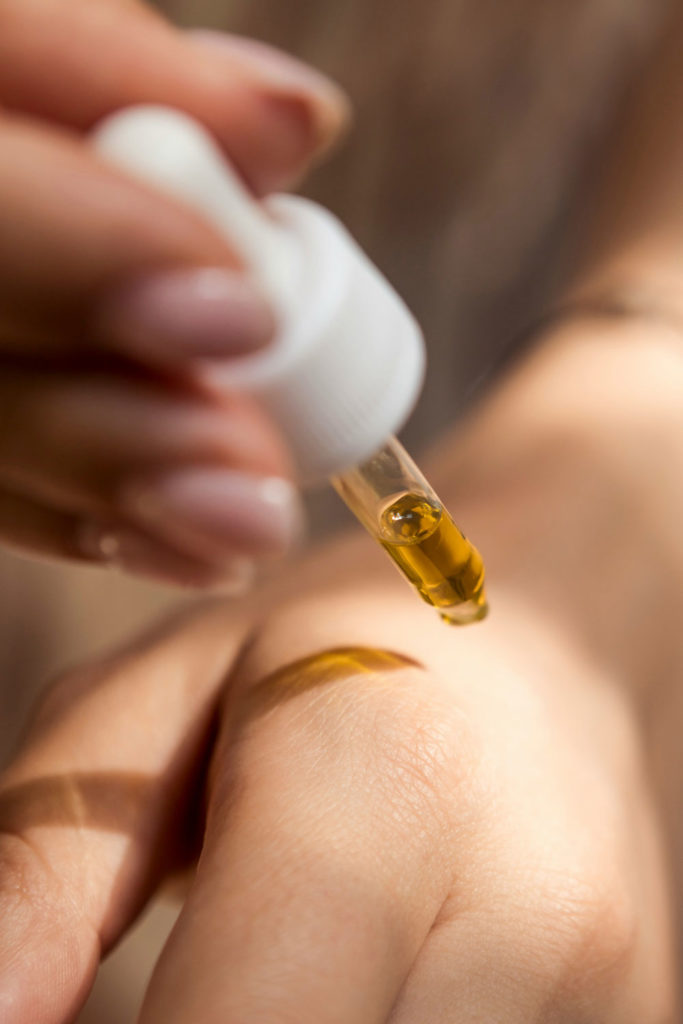 serum dropping onto skin