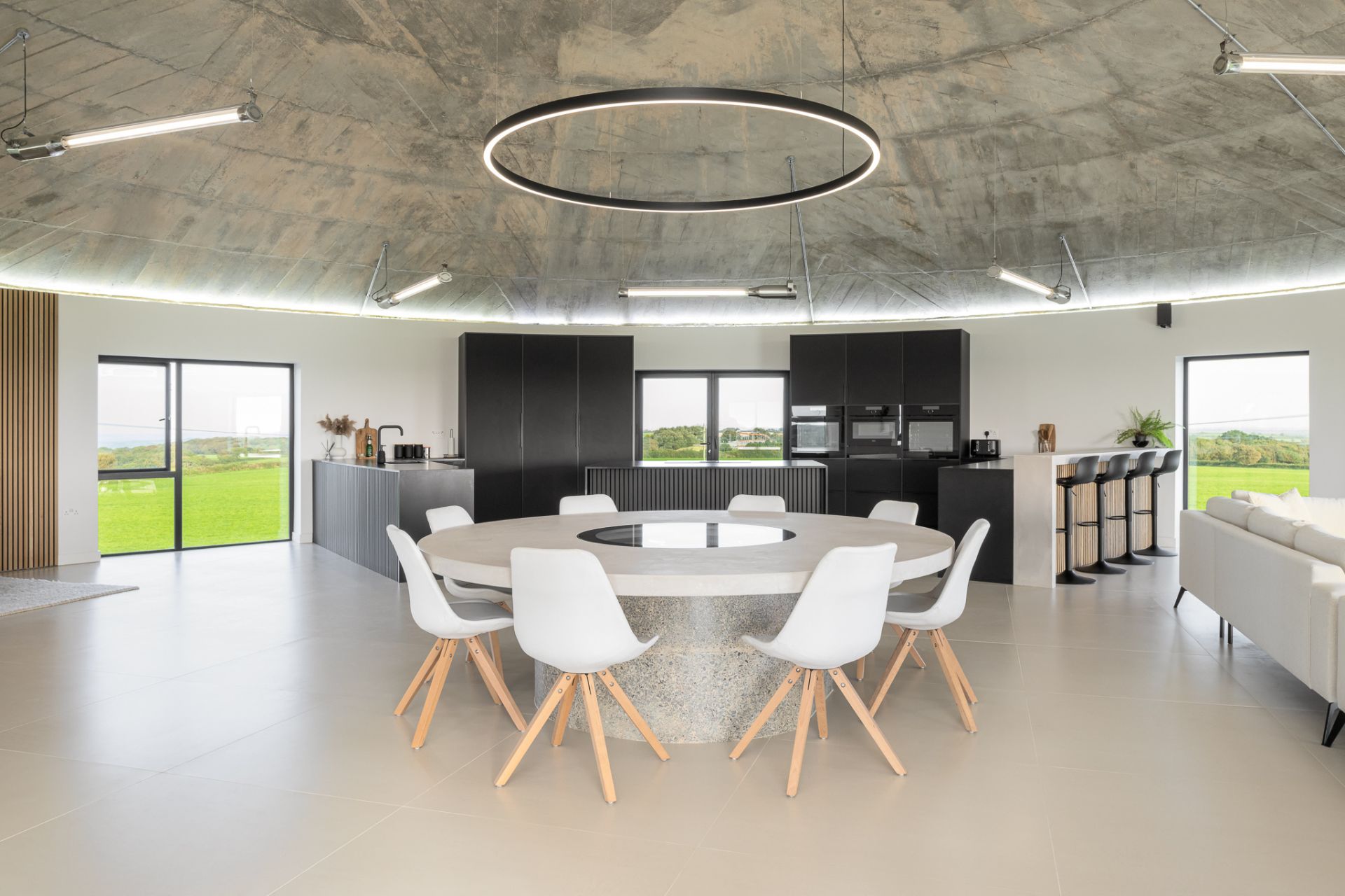 Circular kitchen with concrete dining table