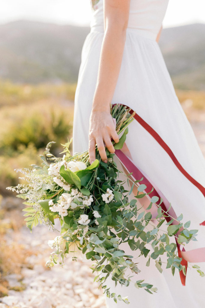 A bride holding a wedding bouquet