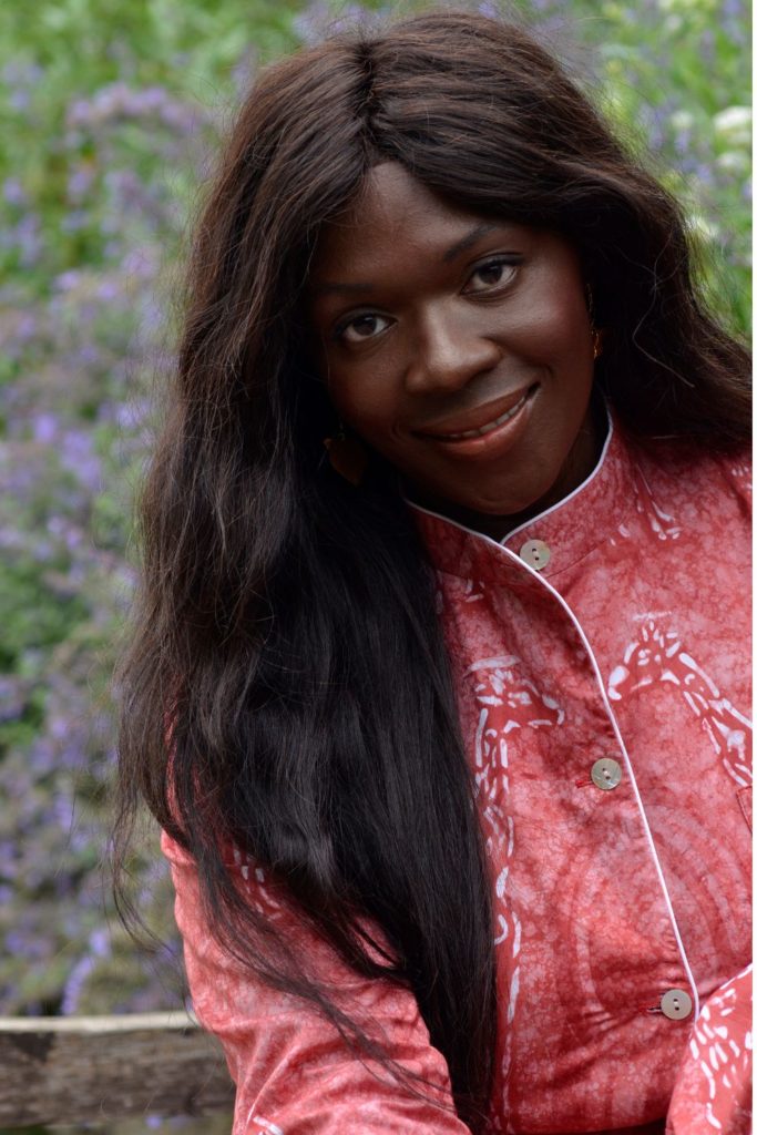 Tuvie Ejoh wearing a red kimono