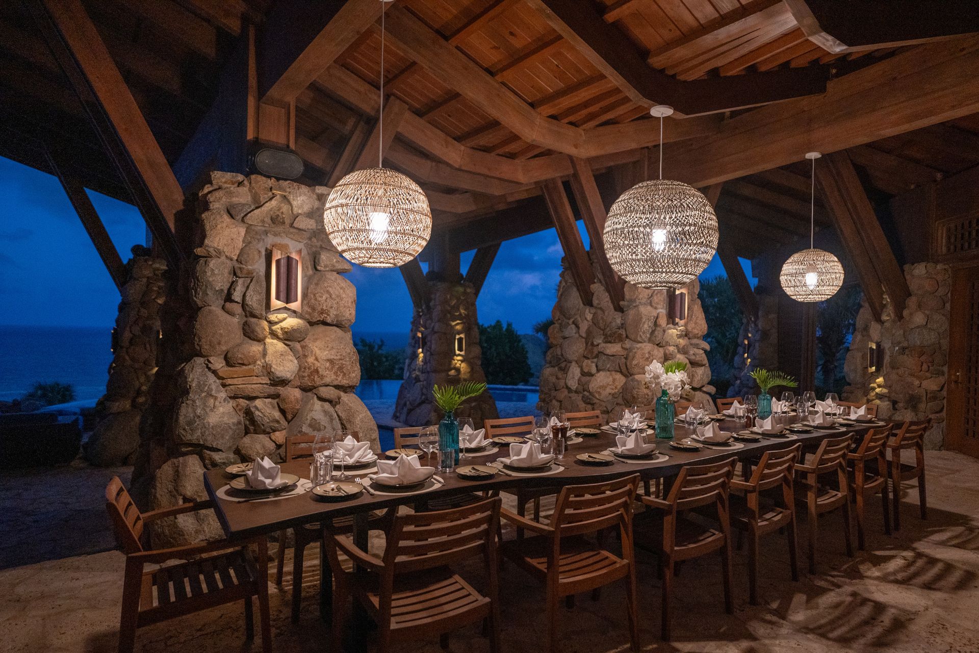 Ocean-view dining area at night
