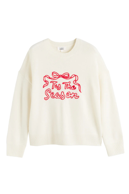 Cream sweater with red text