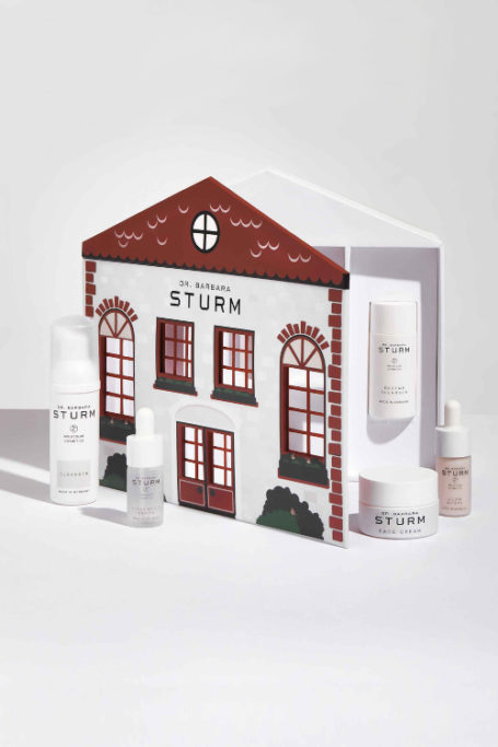 Box shaped like house with beauty products