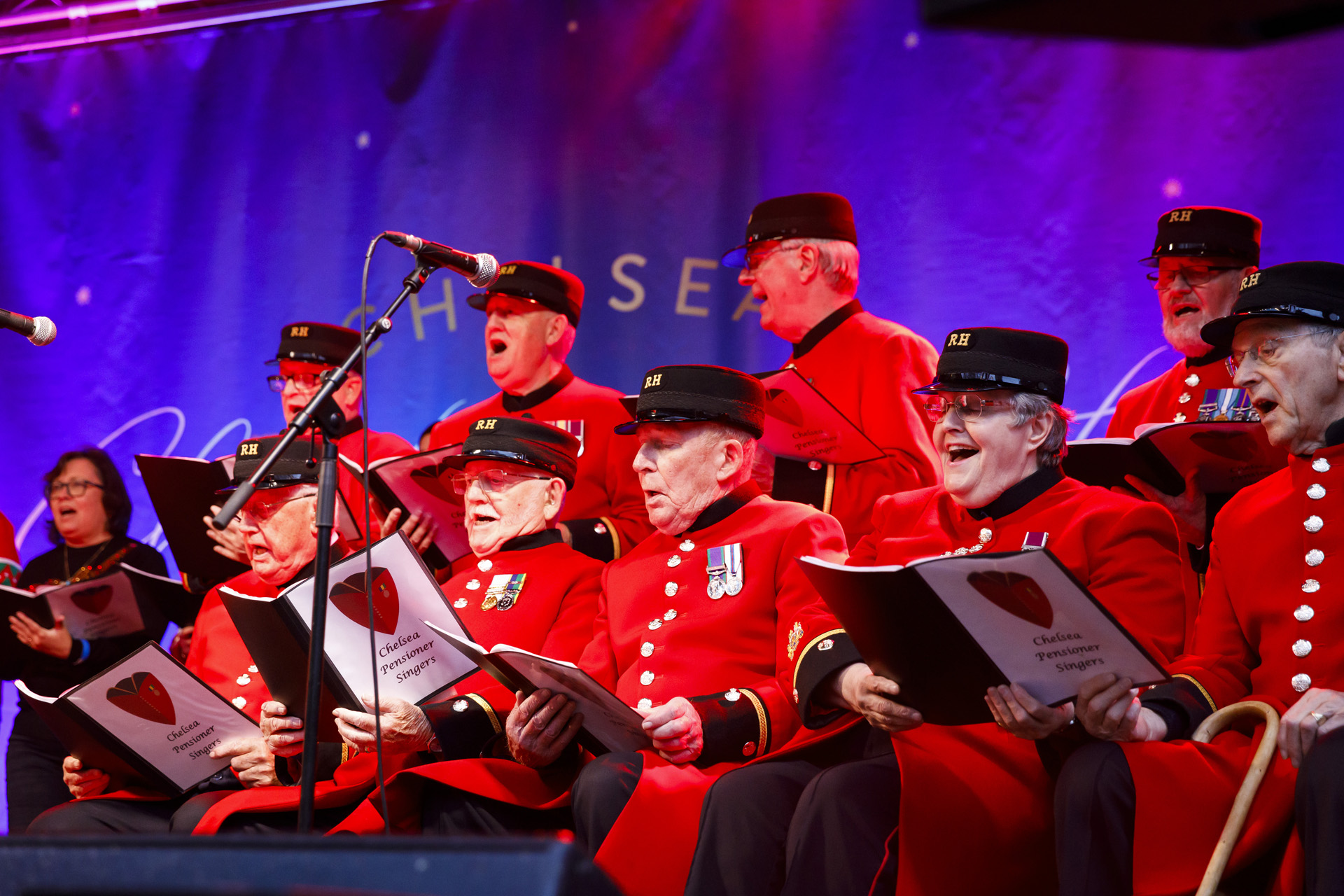 The Chelsea Pensioners performing at the Chelsea Christmas Lights Switch-On 2023.