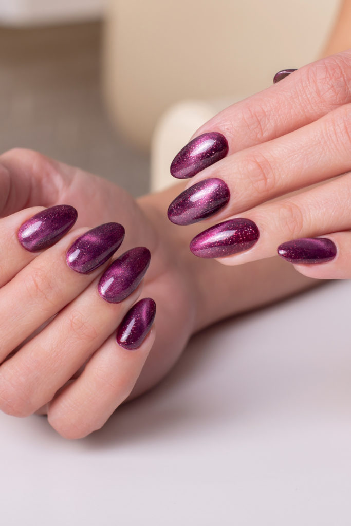 Purple Sagittarius themed nails