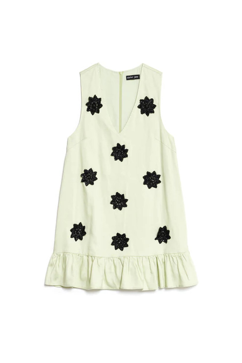 Pale dress with black flowers