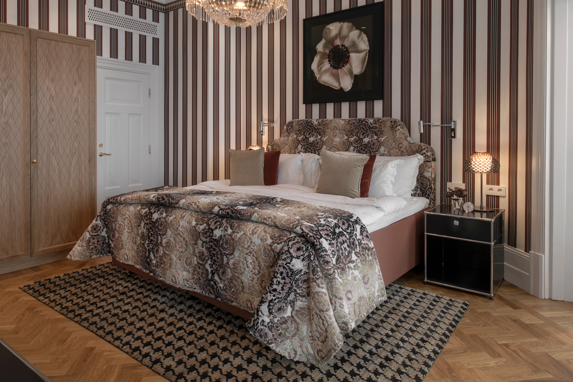 Bedroom with striped wallpaper | The Grand Hôtel