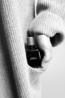 Bottle of Cuir de Connolly in a hand | British Luxury News November 2024