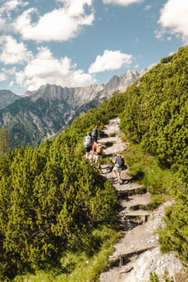 Group of people walking up a mountain in Austria
