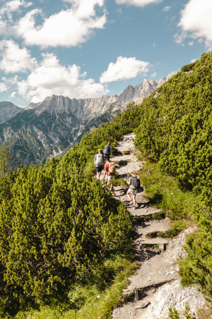 Group of people walking up a mountain in Austria