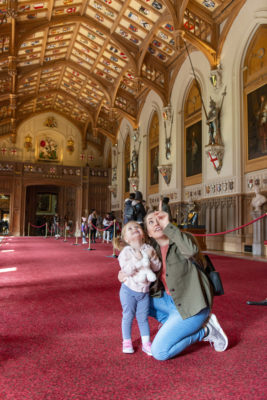 A mother and young daughter in Windsor Palace