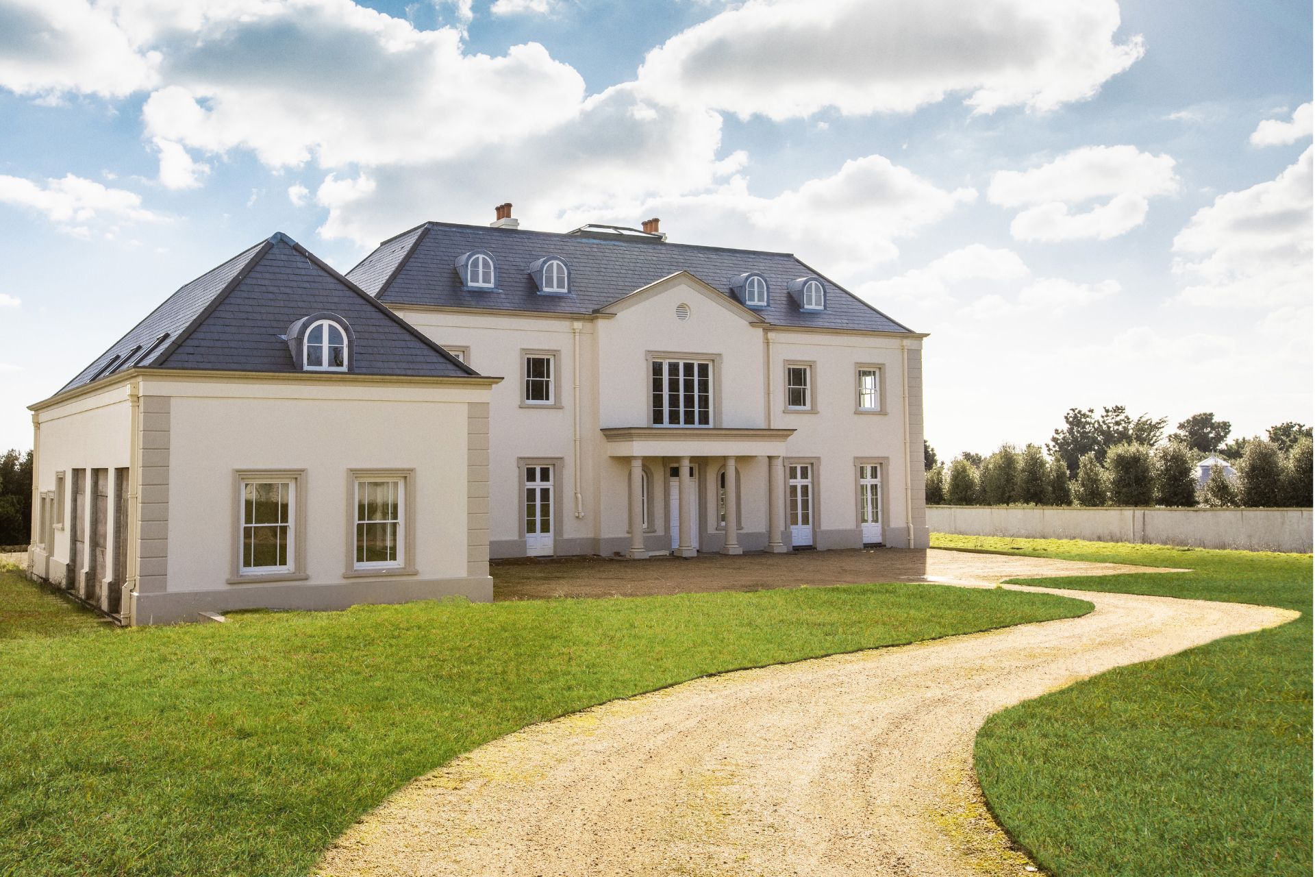 New-build mansion with a sweeping driveway