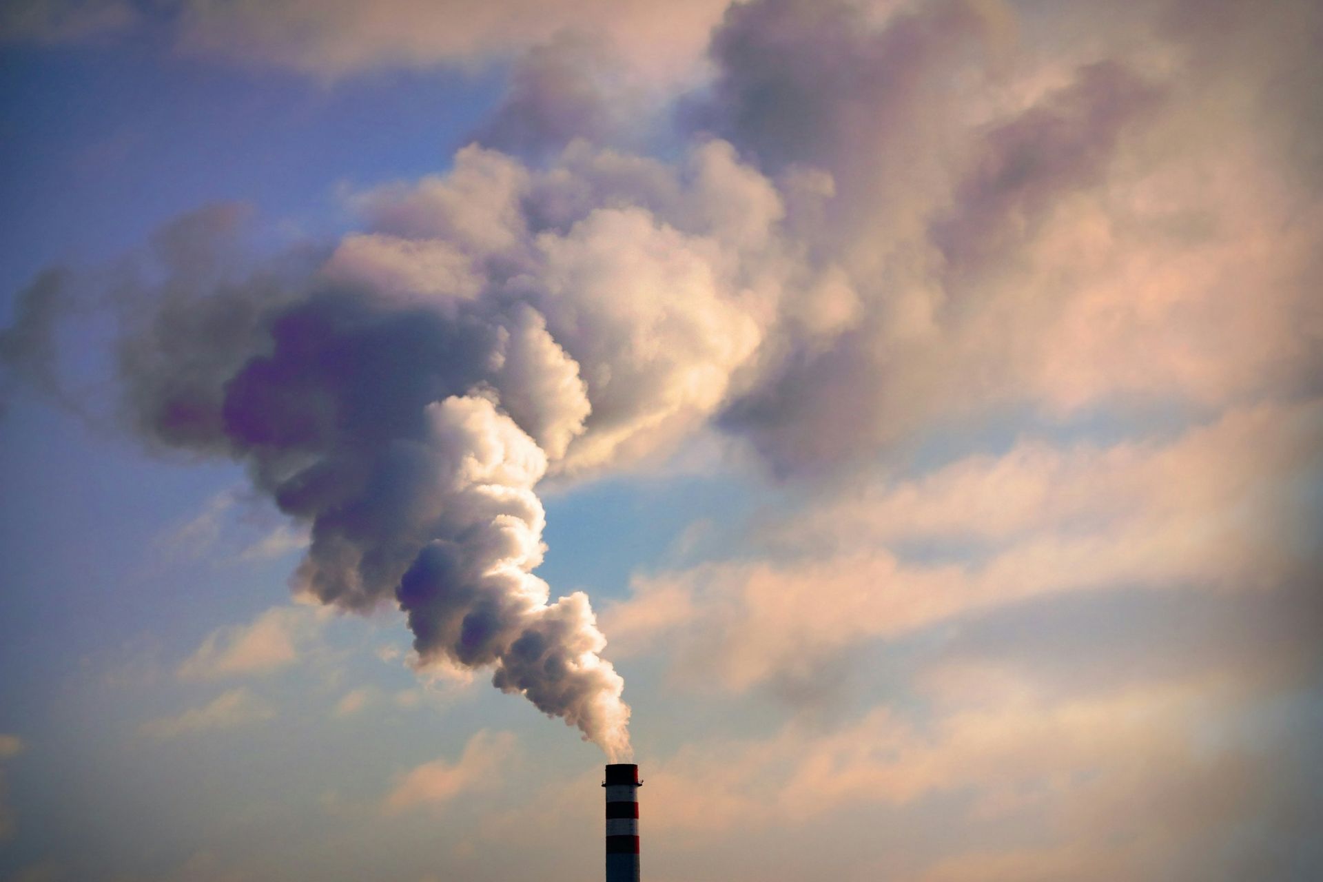 Cloud of pollution in blue sky